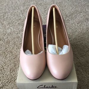 Brand new adorable light pink Clark’s wedges.